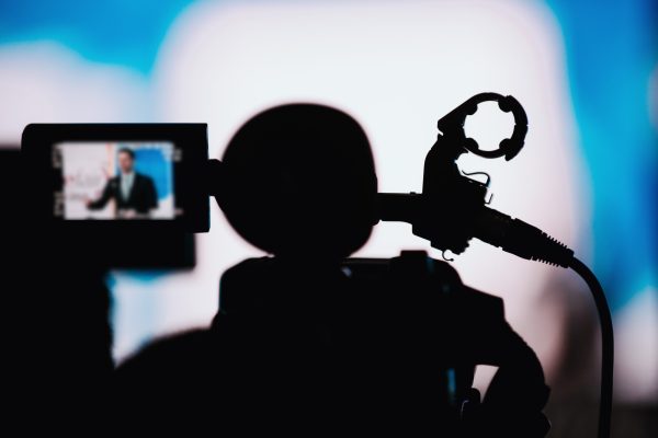 Camera Recording Presentation Of A Speaker